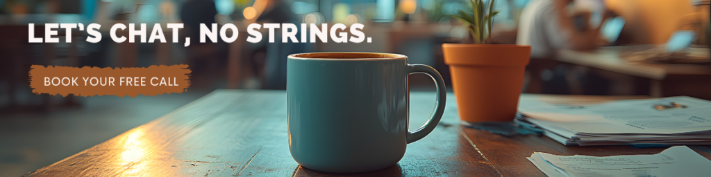 A cozy coffee mug on a wooden table with a small potted plant, surrounded by papers in a warm café setting. The text reads "Let’s Chat, No Strings. Book Your Free Call."