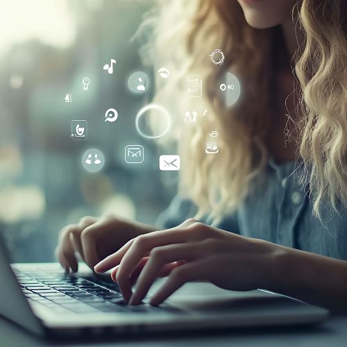 Person typing on laptop with email icons — Simplified Newsletter Solution™